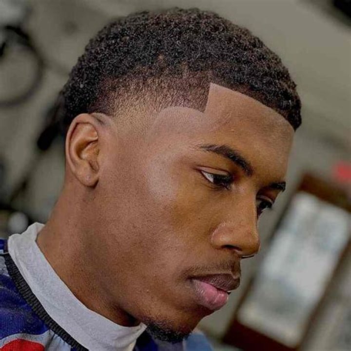 Ultimate Guide to Low Taper Fade Hairstyles for Black Men with Short Hair